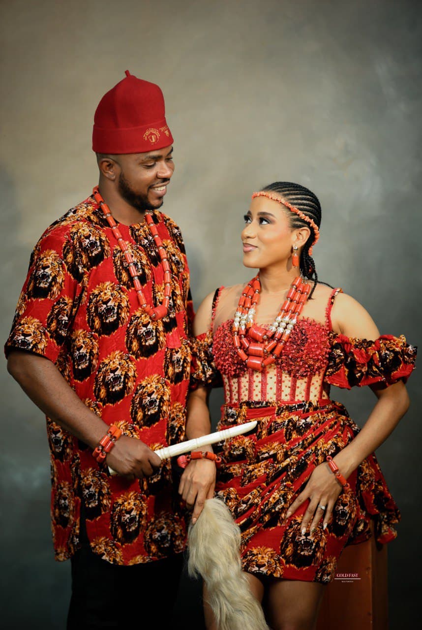 The couple in traditional Igbo attire (Isi Agu and George fabric).